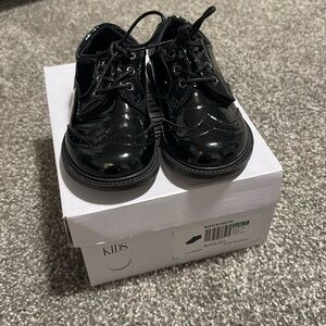 Kids black dress shoes. Size 7. Only worn once